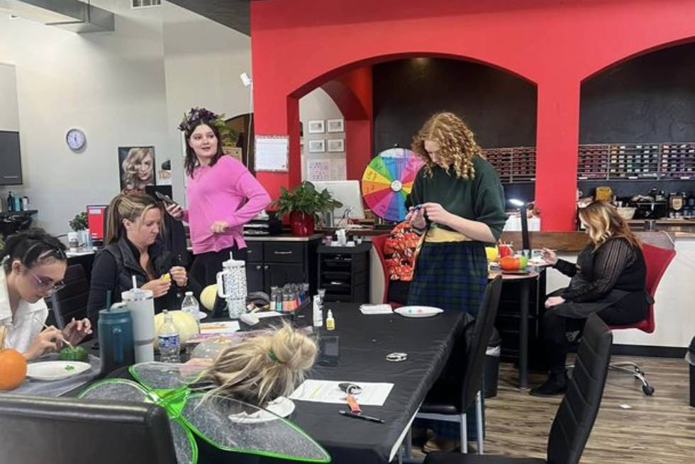 a group of cosmetologists in a room